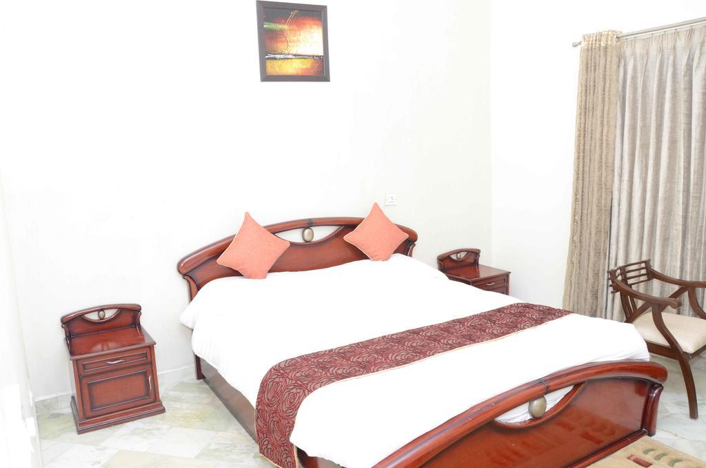 Namaste Apartments Yeni Delhi Oda fotoğraf